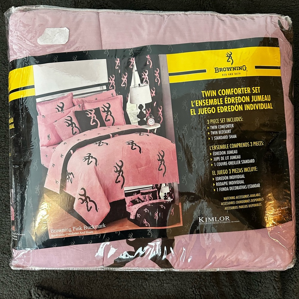 Browning pink twin comforter set. Plus matching valance and and curtain.